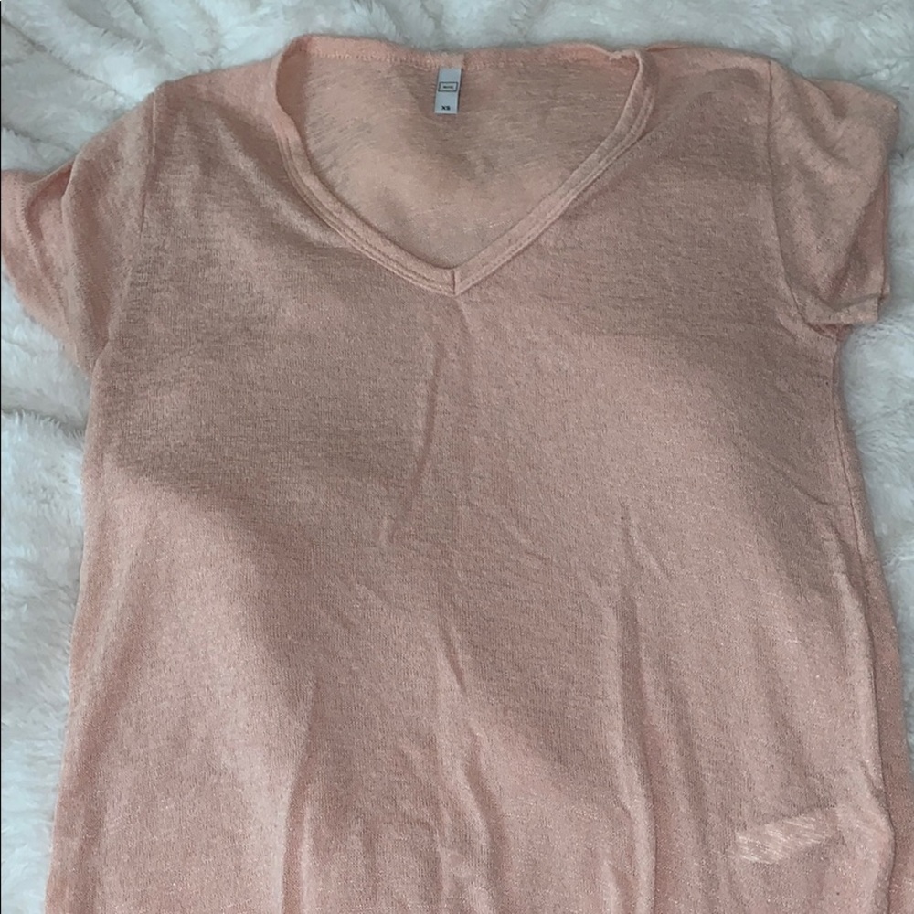 Light pink blouse.